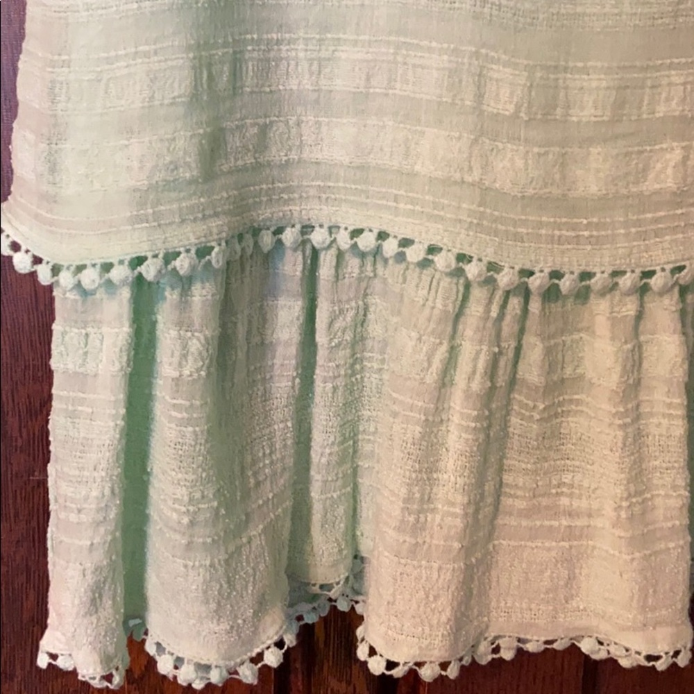 Mint green cotton tank with cute details.